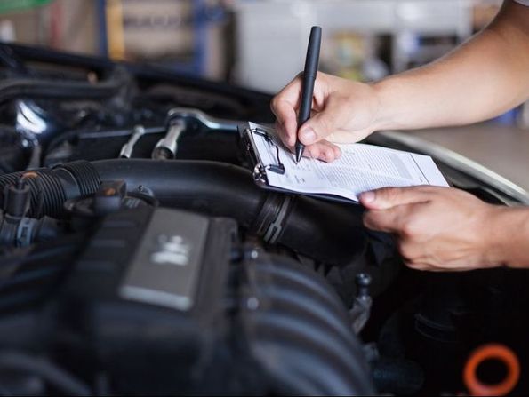 Our Mechanic servicing a car