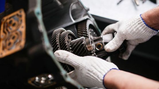 A Mechanic fixing a gearbox